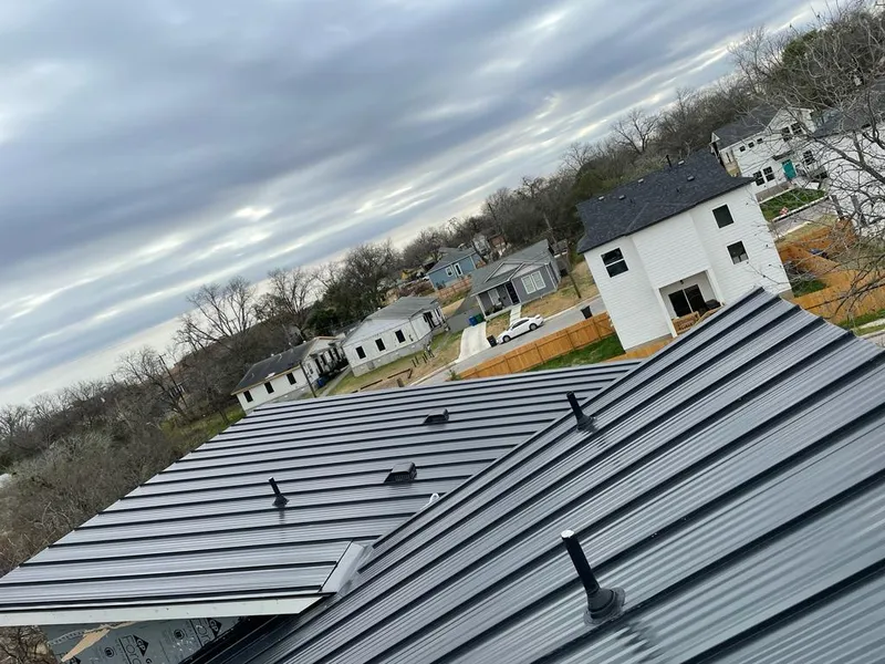 Standing seam metal roof panels with vents for Skylight Repair in Bowling Green